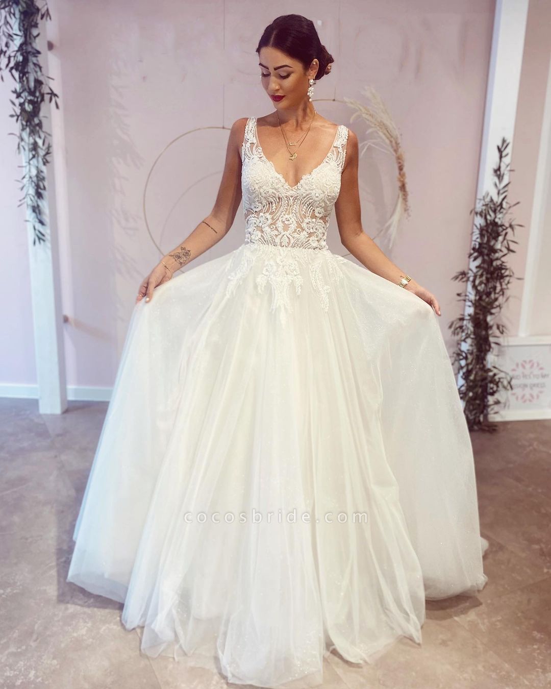 Stunning A-Line Deep V-neck Backless Wedding Dress With Appliques Lace